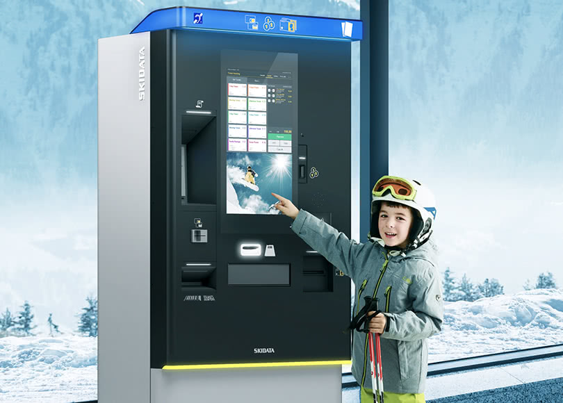 little-skier-buying-ticket-skiosk-smart-810x580