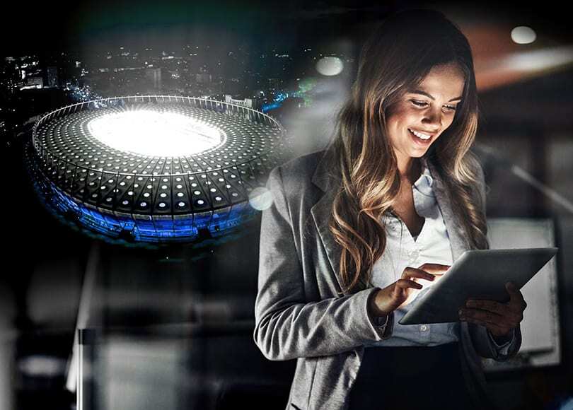 handshake-logic-stadium-woman-tablet-810x580